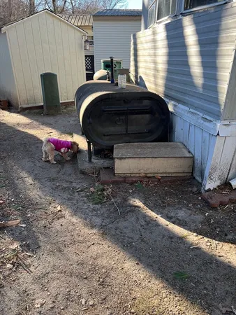 a view of a door of a house with a patio