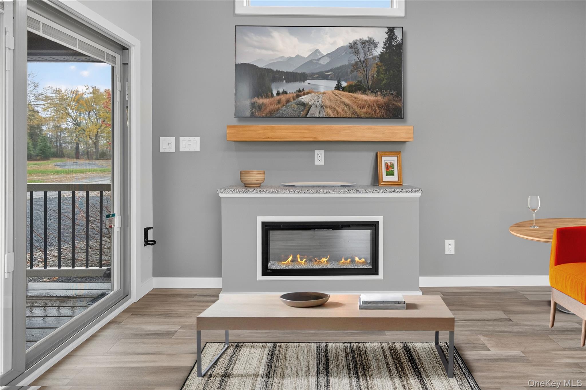 197 Wheeler Road, Unit 90 Florida, NY 10921 - Photo 13 of 34 Living room fireplace is standard in this model.