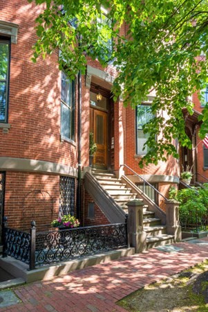 75 Montgomery Street, Unit 4 Boston, MA 02116 - Photo 13 of 14 a front view of a house with a yard