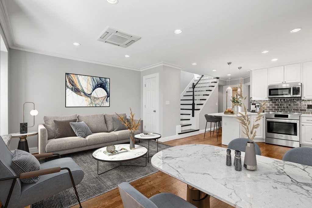 75 Montgomery Street, Unit 4 Boston, MA 02116 - Photo 2 of 14 a living room with furniture and kitchen view
