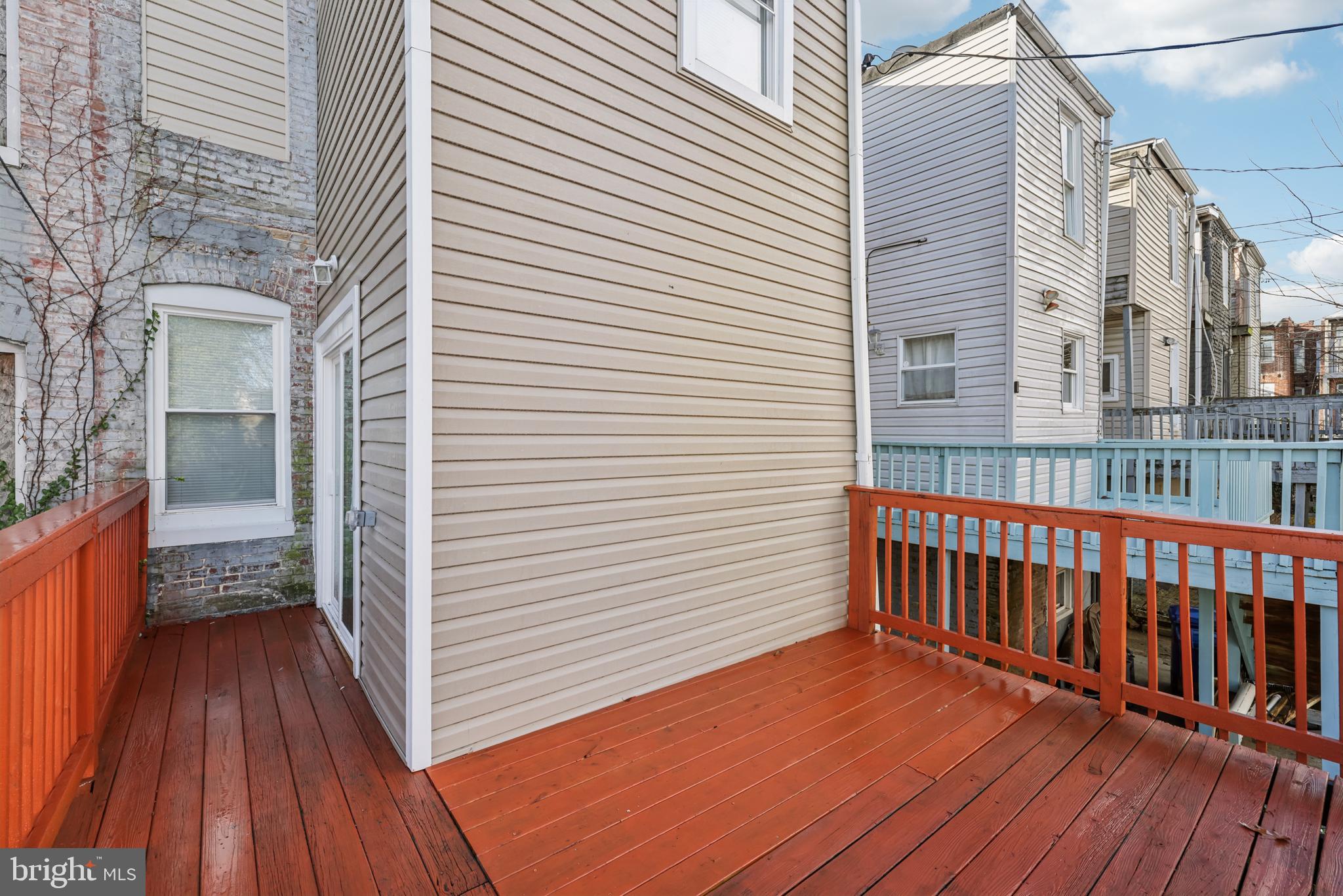 2820 Brighton Street Baltimore, MD 21216 - Photo 34 of 38 a view of a wooden deck