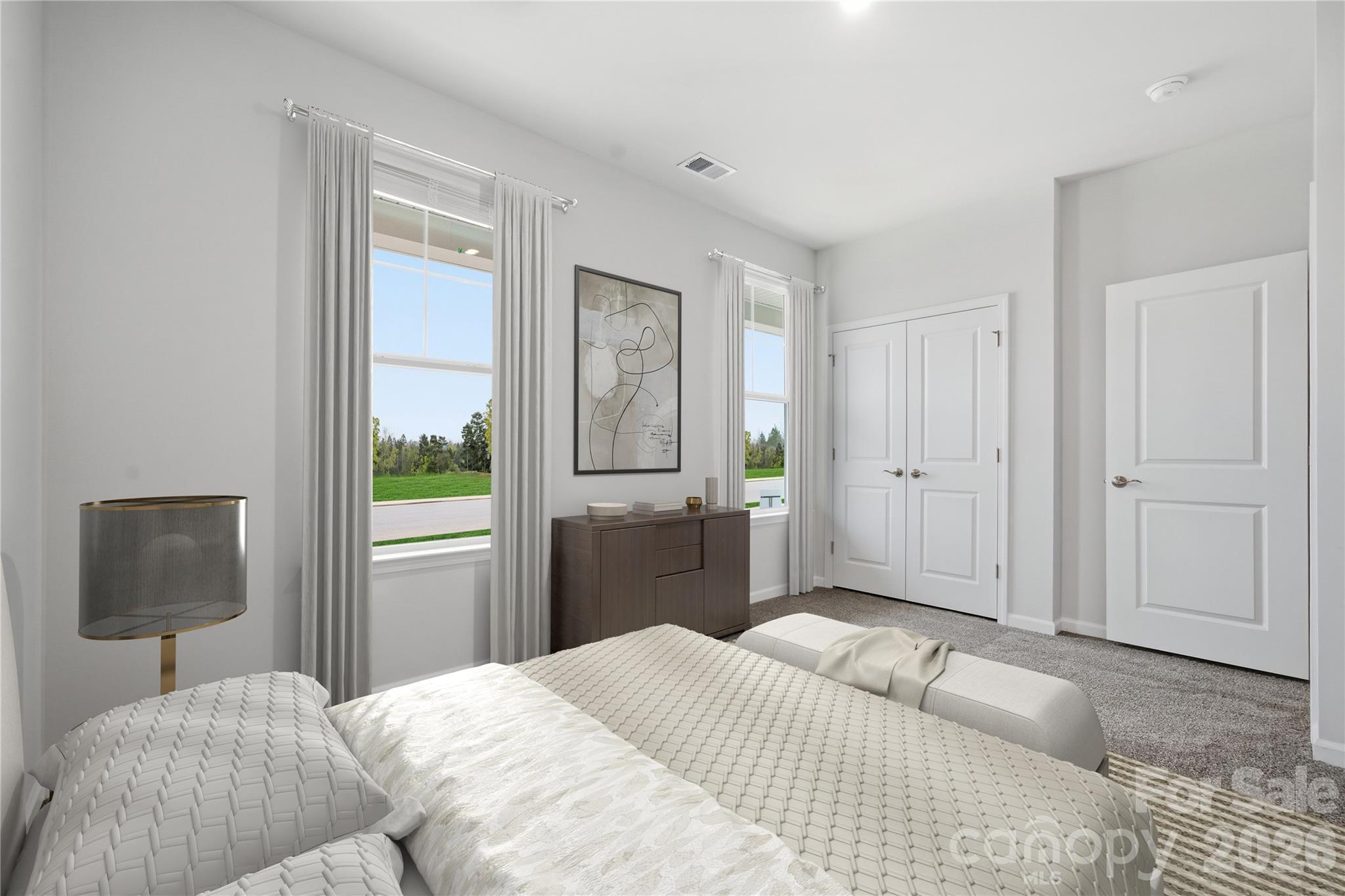 1100 Arundle Road Sherrills Ford, NC 28673 - Photo 17 of 35 a bedroom with a bed and a window