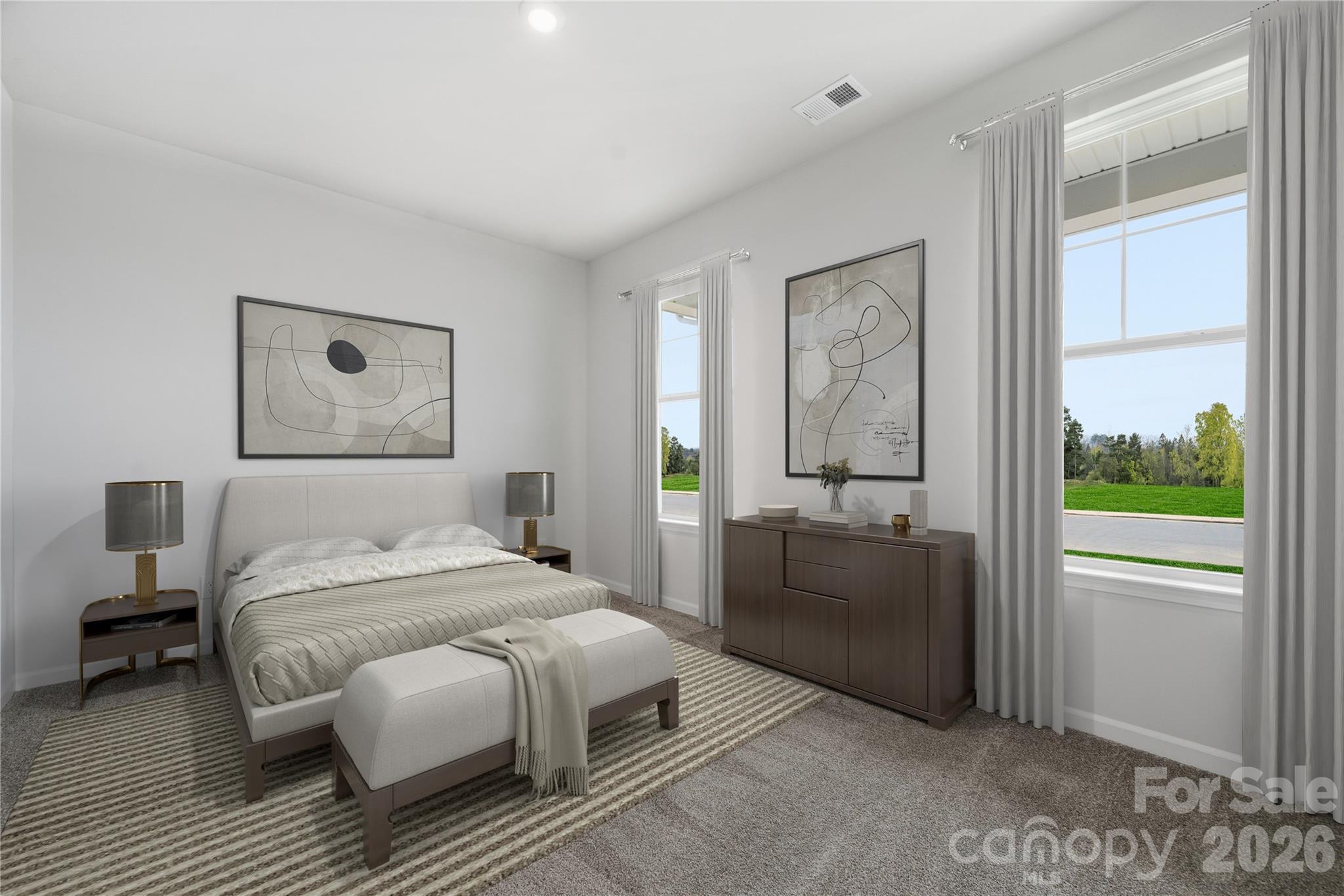 1100 Arundle Road Sherrills Ford, NC 28673 - Photo 18 of 35 a bedroom with a bed and a couch