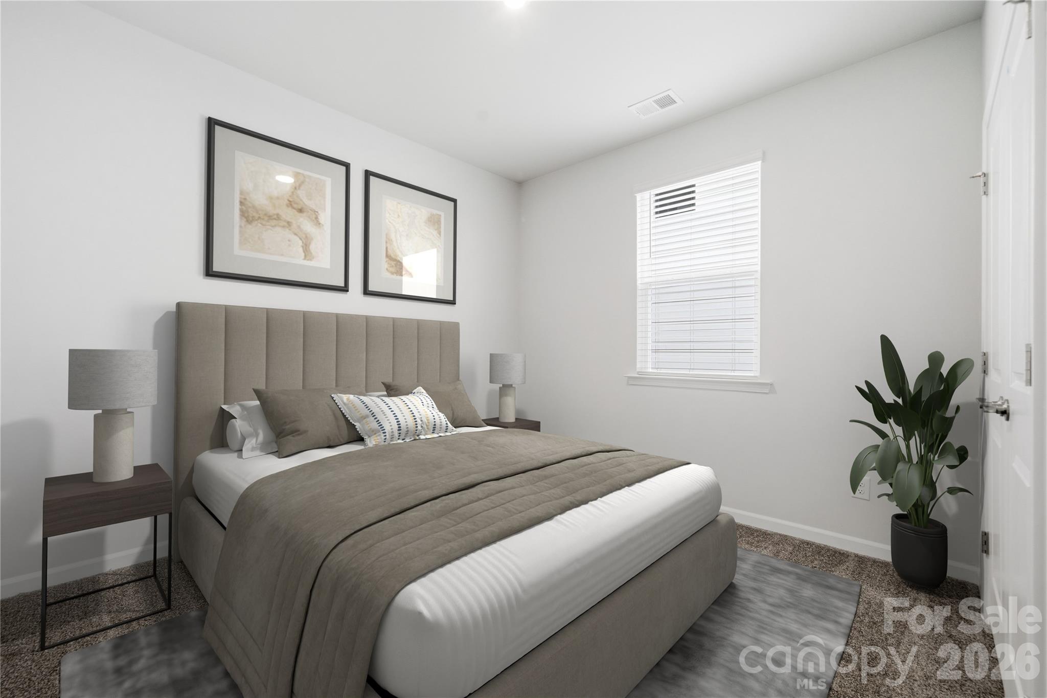 1100 Arundle Road Sherrills Ford, NC 28673 - Photo 20 of 35 a bedroom with a large bed and a window