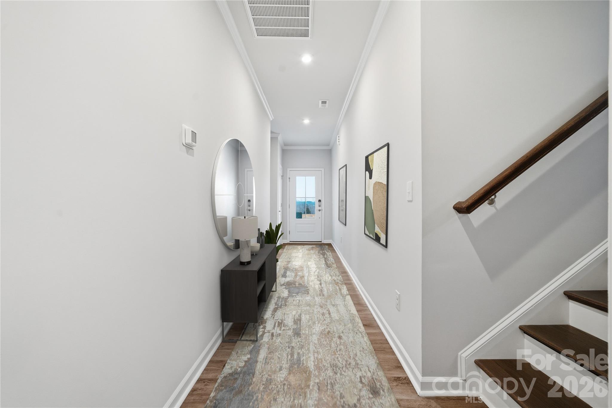 1100 Arundle Road Sherrills Ford, NC 28673 - Photo 25 of 35 a view of a hallway with wooden floor and staircase
