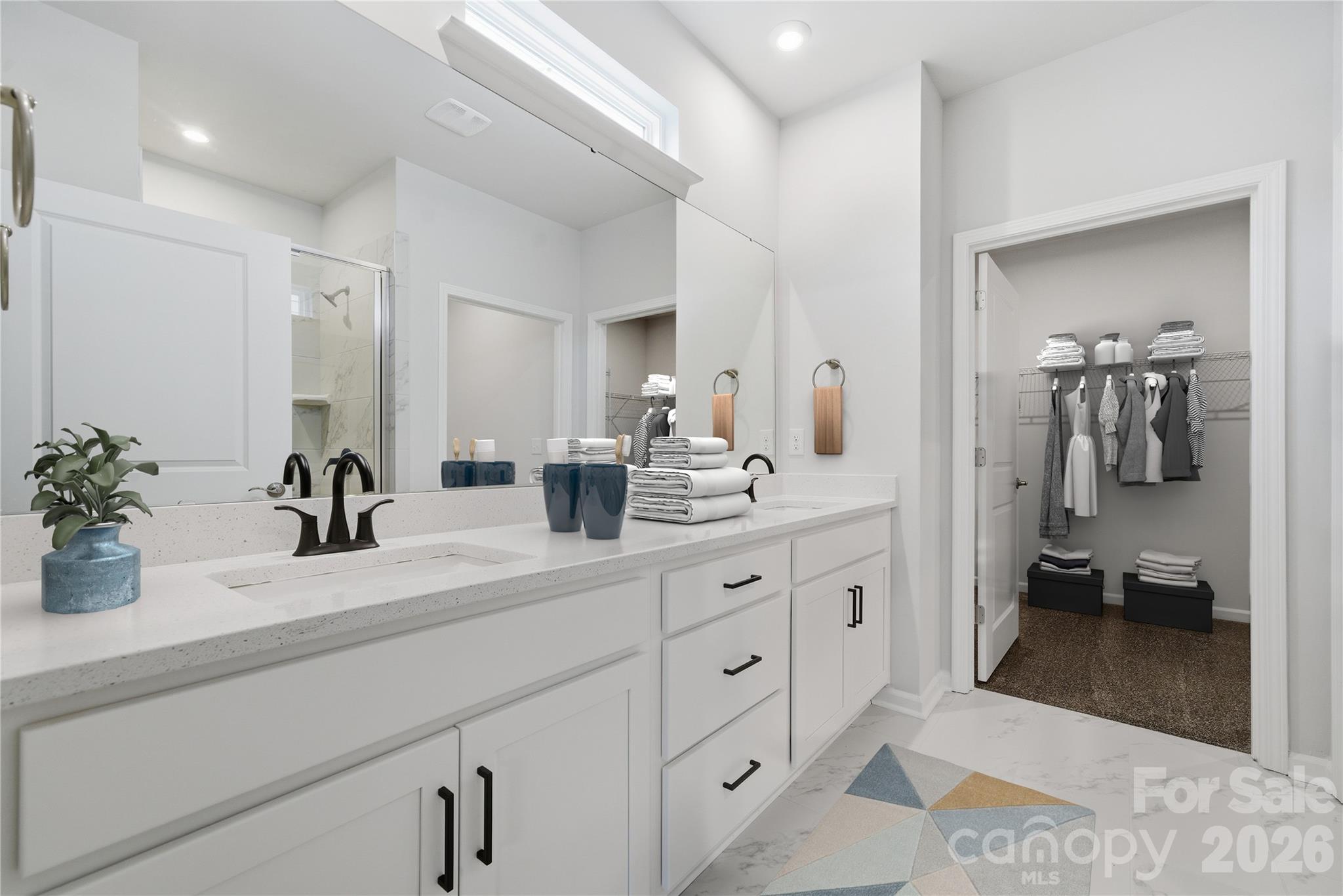 1100 Arundle Road Sherrills Ford, NC 28673 - Photo 9 of 35 a spacious en suite bathroom with double sink and a mirror