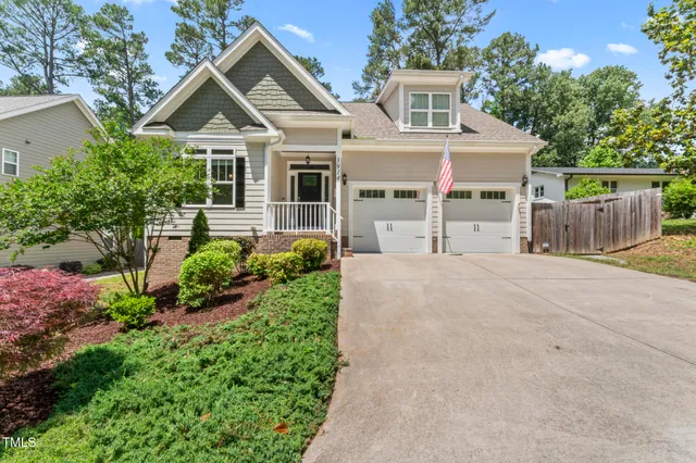 front view of a house with a small yard
