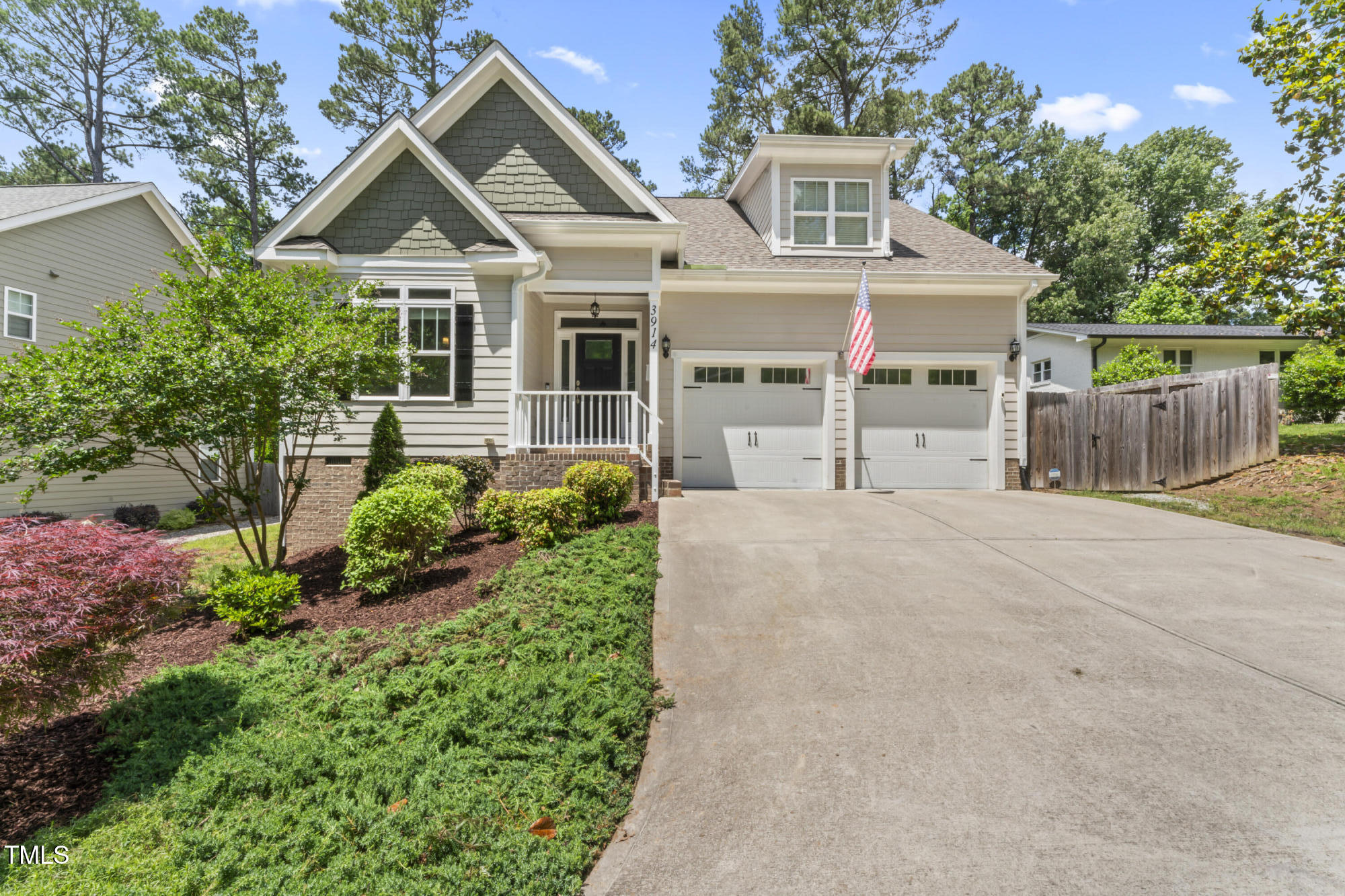 front view of a house with a small yard