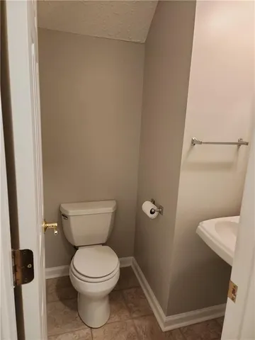 a bathroom with a toilet