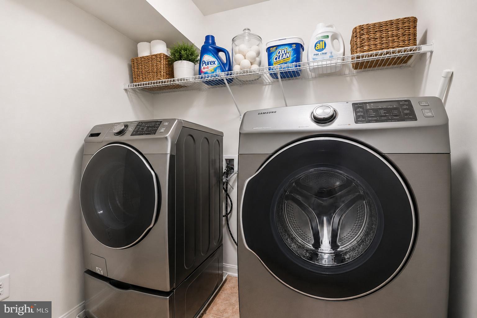 16183 Raptor Crest Lane Woodbridge, VA 22193 - Photo 29 of 51 Sleek laundry room with modern appliances.