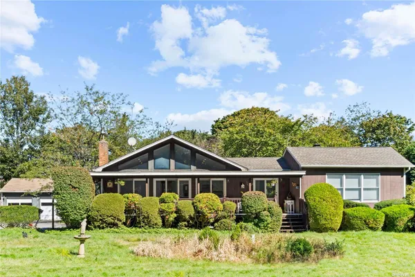 front view of house with a yard