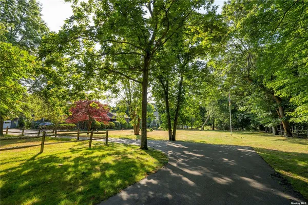 a view of a playground with basketball court