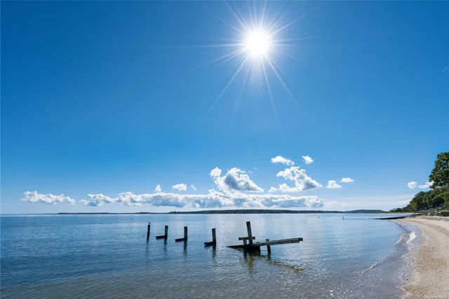 a view of a room with lots of wooden table and chairs