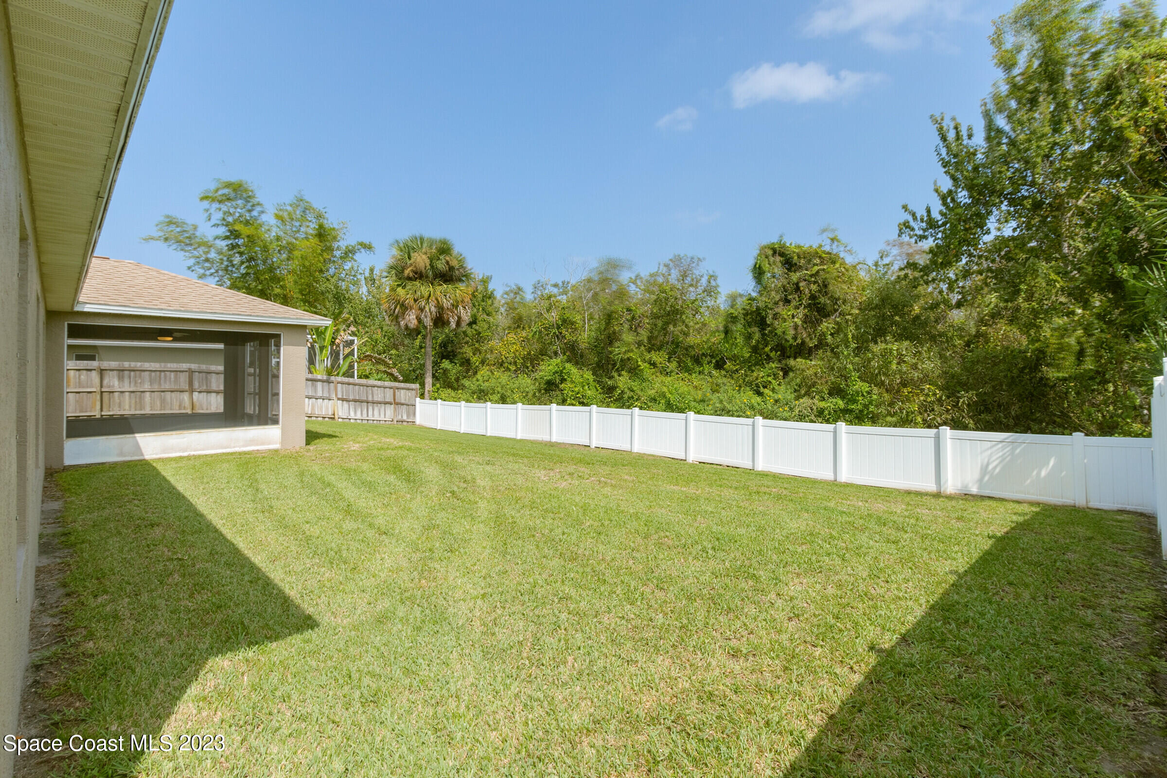 4181 Long Leaf Drive Melbourne, FL 32940 - Photo 32 of 37 a view of an outdoor space and a yard