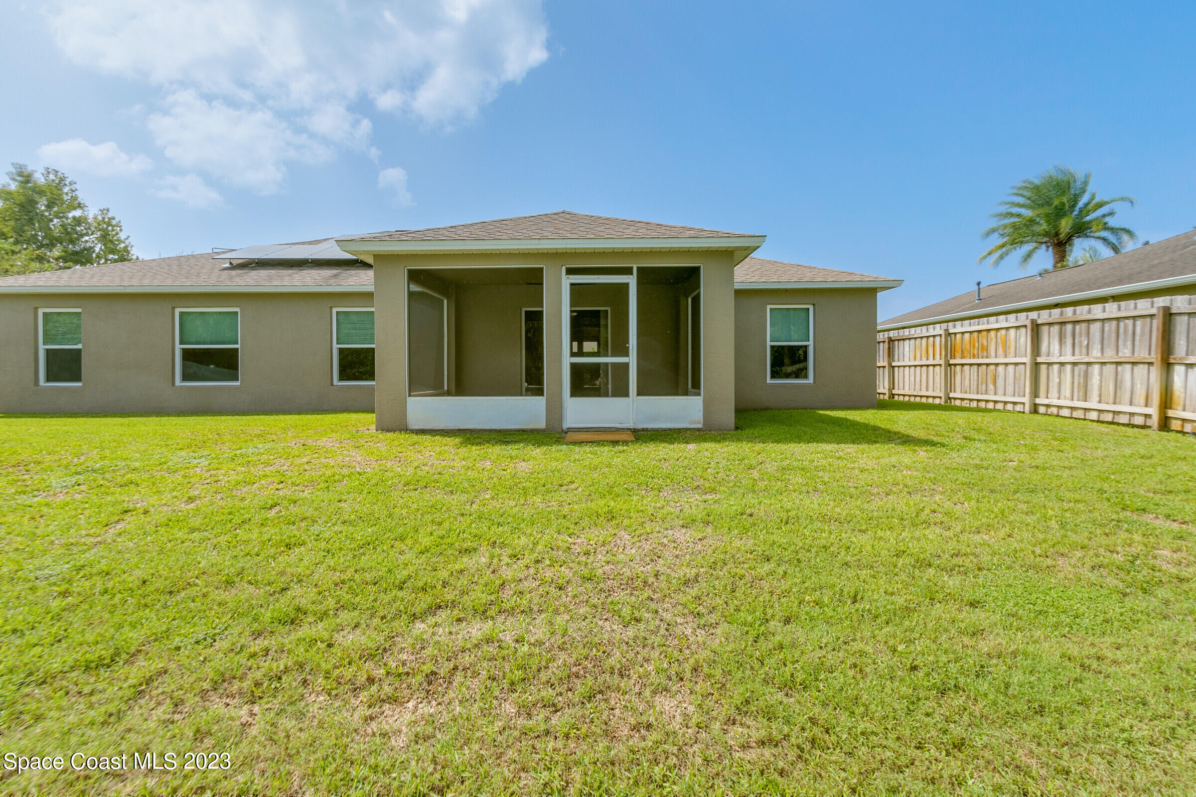 4181 Long Leaf Drive Melbourne, FL 32940 - Photo 33 of 37 a house with garden in front of it