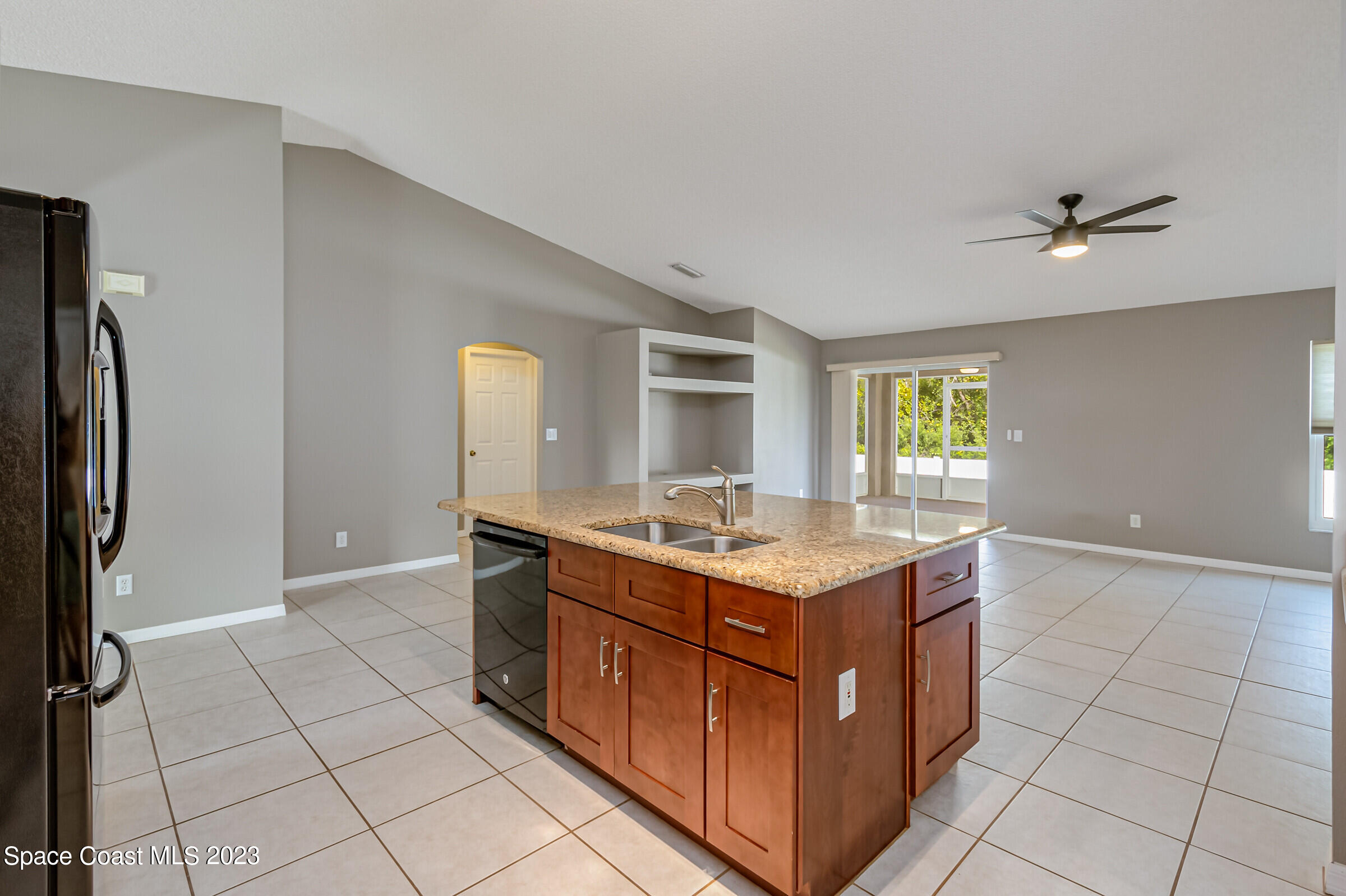 4181 Long Leaf Drive Melbourne, FL 32940 - Photo 37 of 37 a kitchen with a stove and a sink