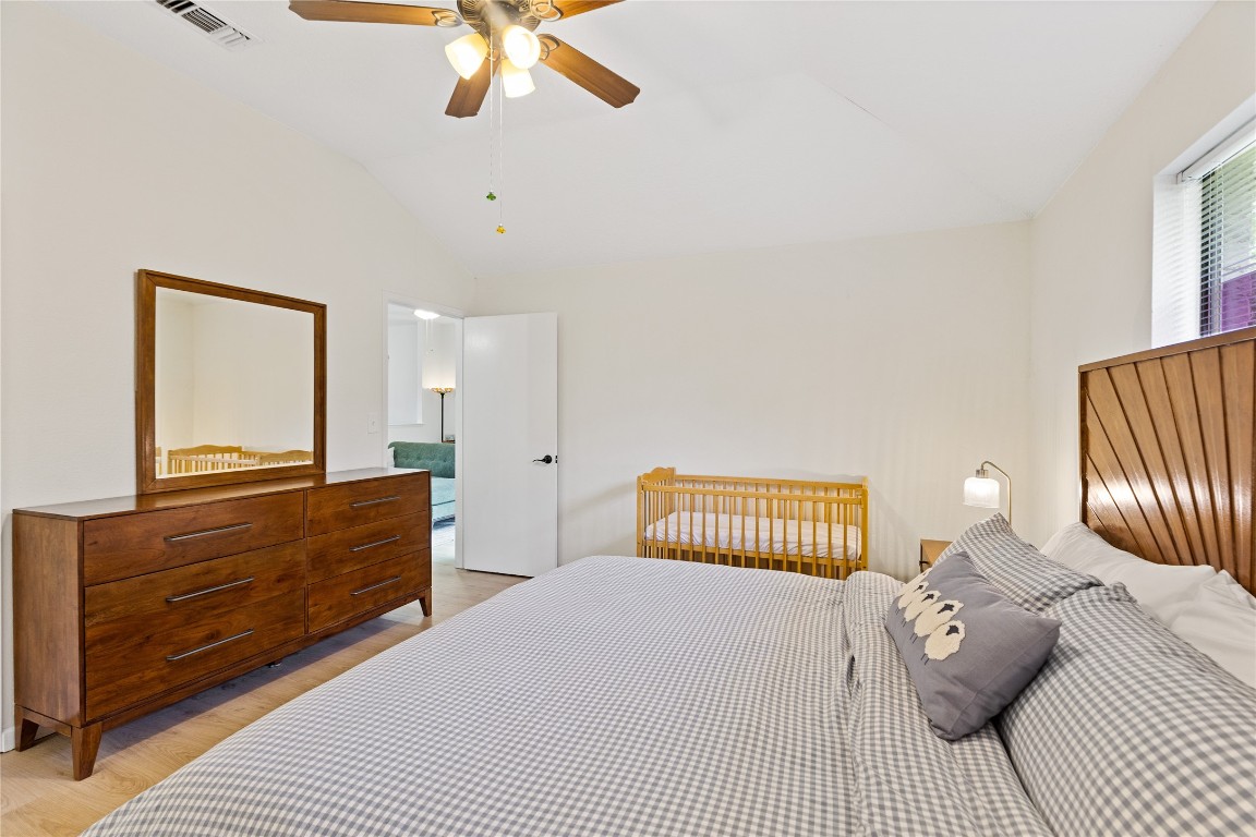 9719 Orangevale Drive Spring, TX 77379 - Photo 16 of 32 Another image of large primary bedroom. All flooring in the home either wood or tile, no carpet in the home.