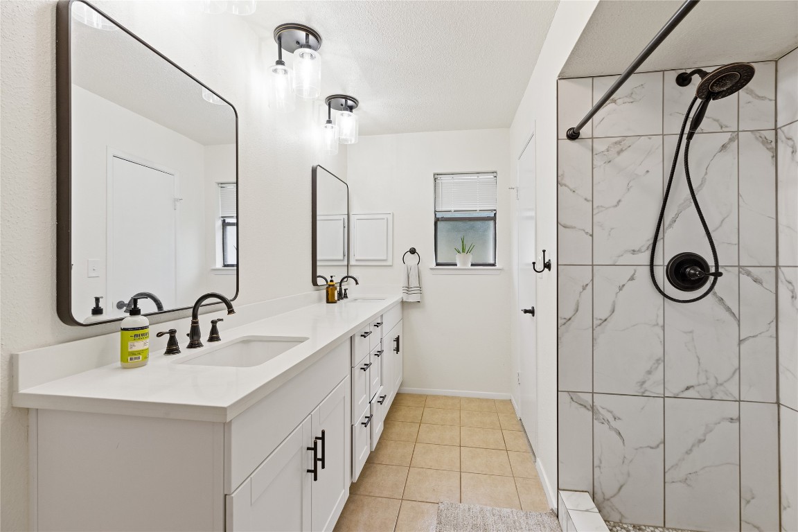 9719 Orangevale Drive Spring, TX 77379 - Photo 18 of 32 Beautifully updated primary bathroom with large walk in shower.