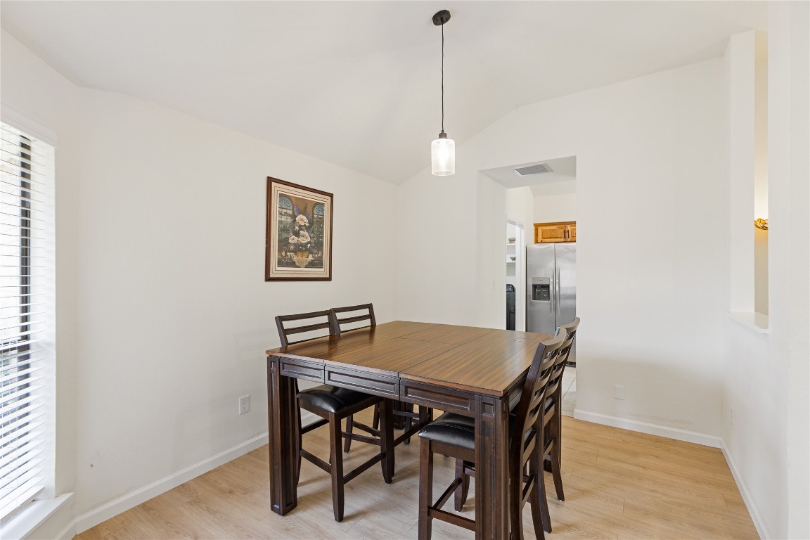 9719 Orangevale Drive Spring, TX 77379 - Photo 20 of 32 Another image of dining room with beautiful flooring and entrance to kitchen.