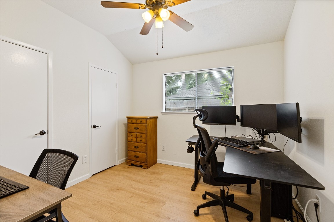 9719 Orangevale Drive Spring, TX 77379 - Photo 22 of 32 Secondary bedroom with attractive flooring and large closet space.