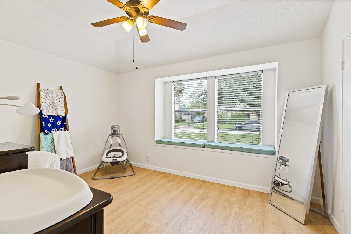 9719 Orangevale Drive Spring, TX 77379 - Photo 23 of 32 Light fills this secondary bedroom through large window with attractive window seat.