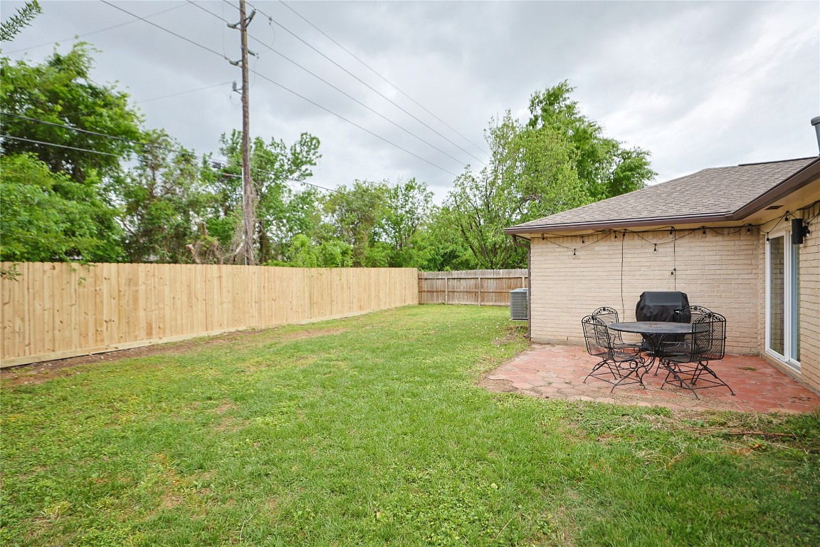 9719 Orangevale Drive Spring, TX 77379 - Photo 29 of 32 Another image of large backyard highlighted by the recently replaced back fence.