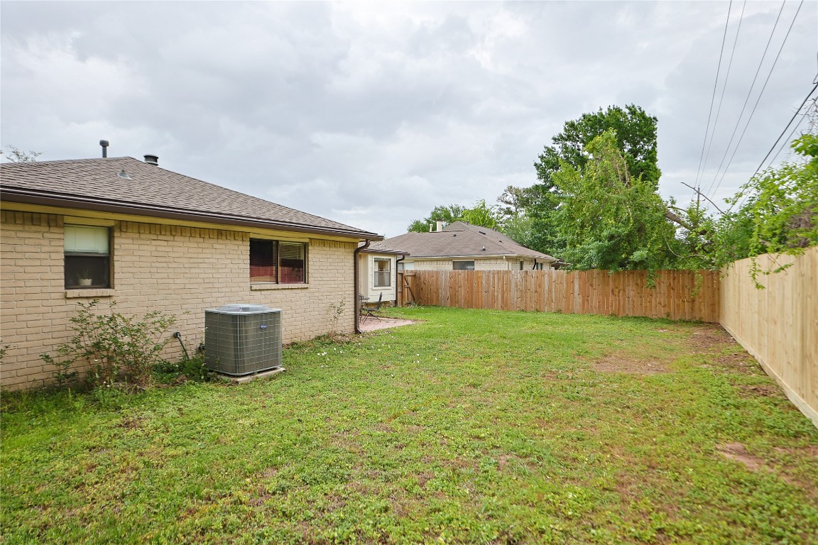 9719 Orangevale Drive Spring, TX 77379 - Photo 31 of 32 Another image of large backyard providing ample green space for all kinds of backyard activities.