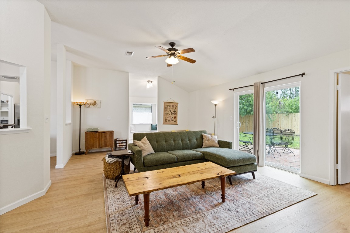 9719 Orangevale Drive Spring, TX 77379 - Photo 5 of 32 Lights streams into this beautiful den through sliding glass doors leading to back patio.