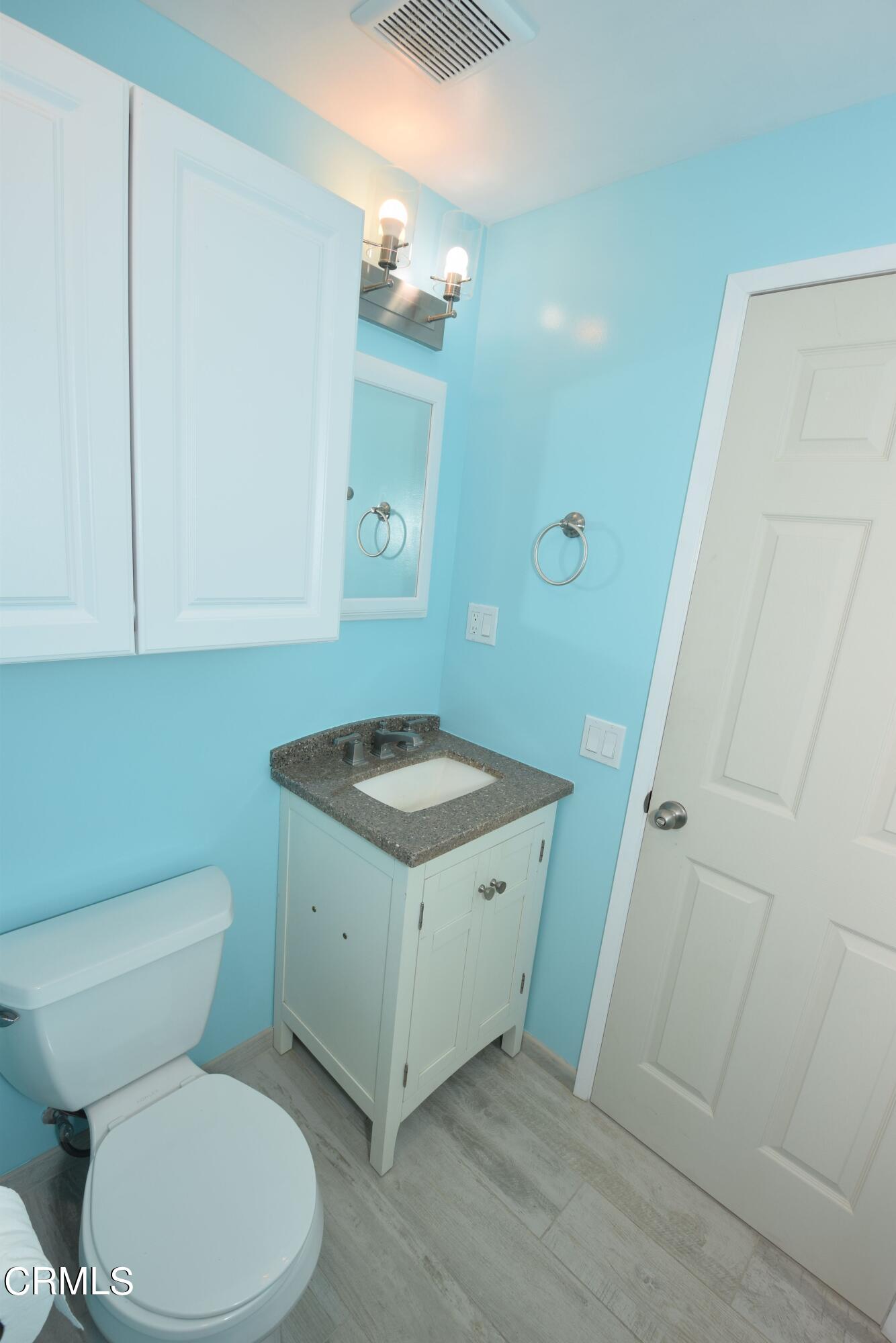 138 Oak Street Camarillo, CA 93010 - Photo 5 of 7 a bathroom with a sink a toilet and shower