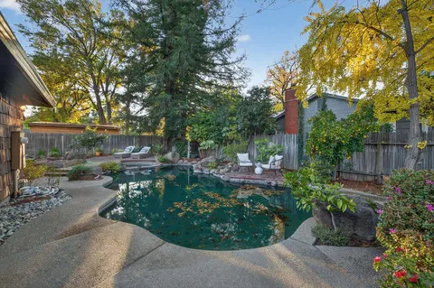 a backyard of a house with lots of green space