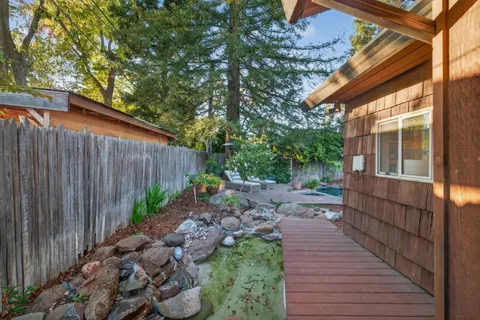 a backyard of a house with lots of green space