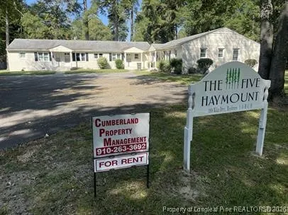 a sign on the side of a road