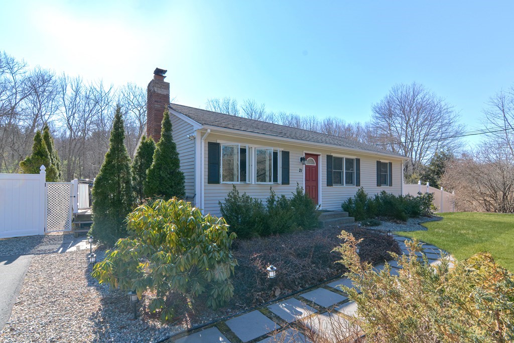 21 Coolidge Street Sherborn, MA 01770 - Photo 2 of 41 a front view of a house with garden