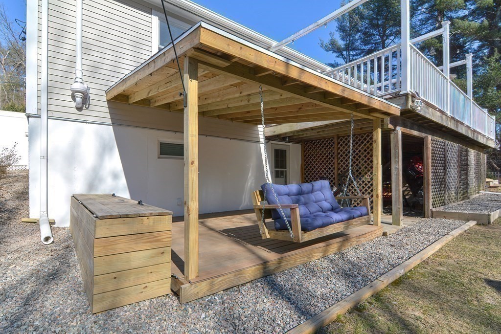 21 Coolidge Street Sherborn, MA 01770 - Photo 28 of 41 a view of a balcony with door