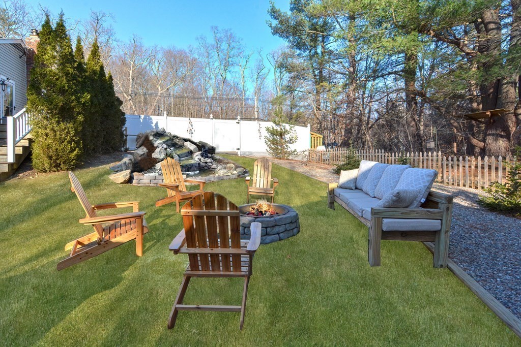 21 Coolidge Street Sherborn, MA 01770 - Photo 32 of 41 a view of a yard with furniture