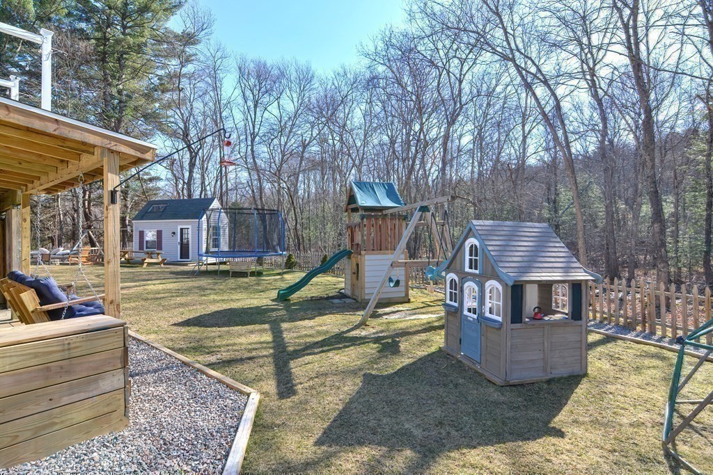 21 Coolidge Street Sherborn, MA 01770 - Photo 34 of 41 a view of a house with backyard