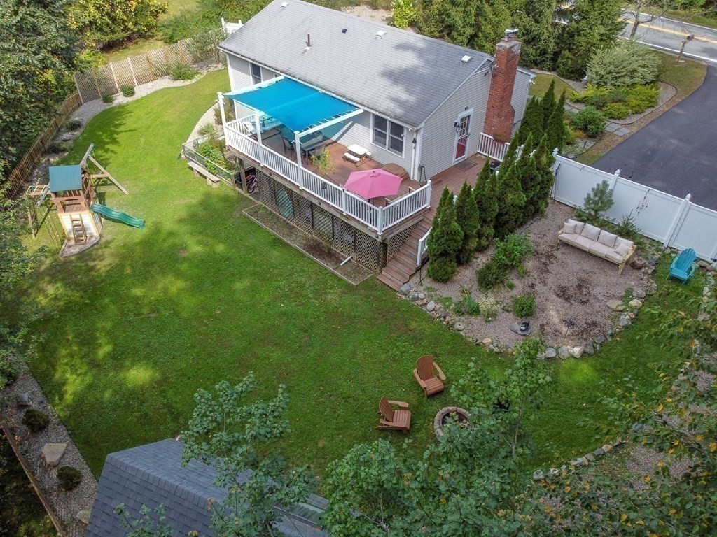 21 Coolidge Street Sherborn, MA 01770 - Photo 38 of 41 an aerial view of a house with a yard