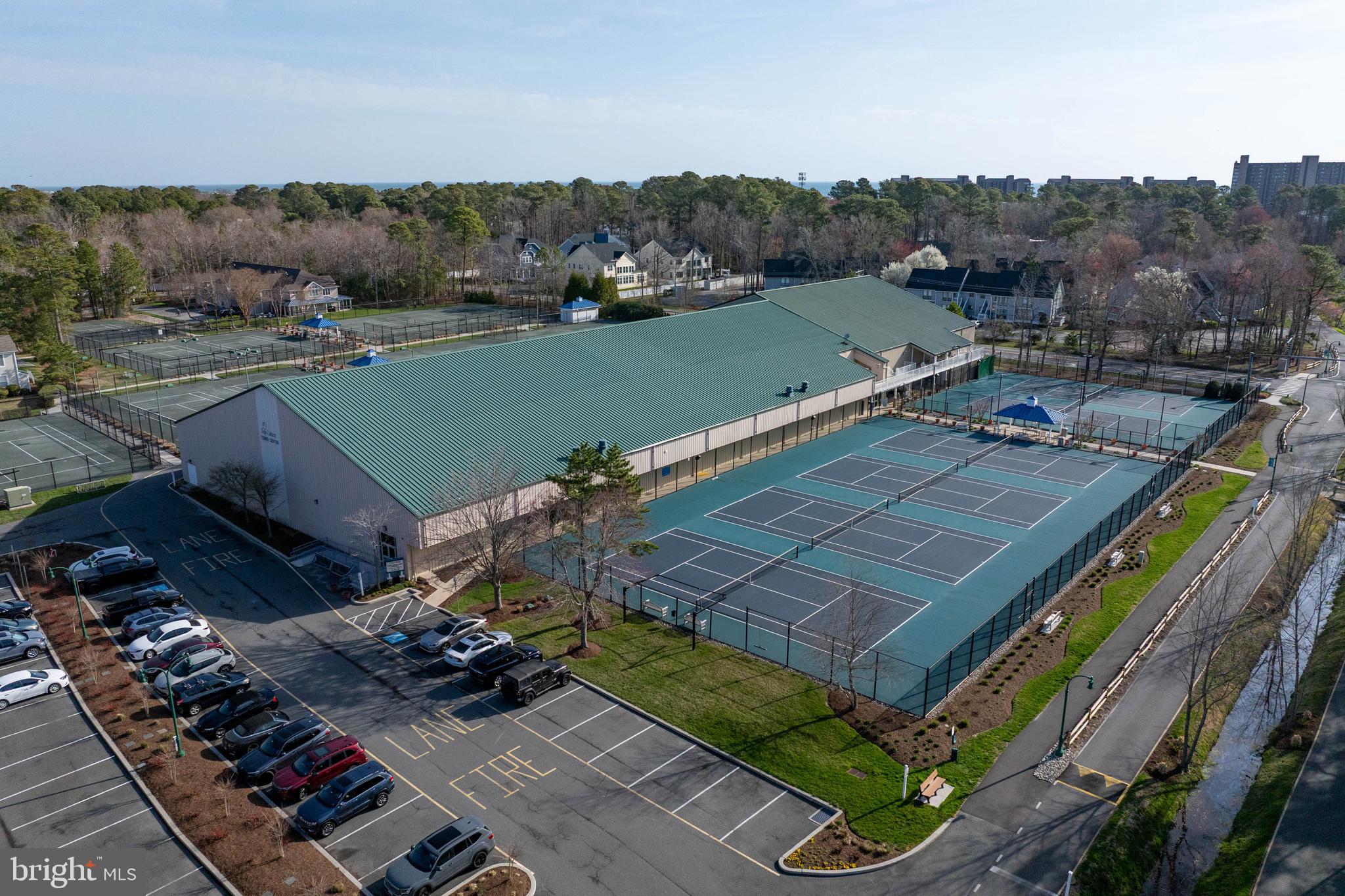 409 Georgetowne House Road Bethany Beach, DE 19930 - Photo 24 of 37 Indoor and outdoor tennis courts