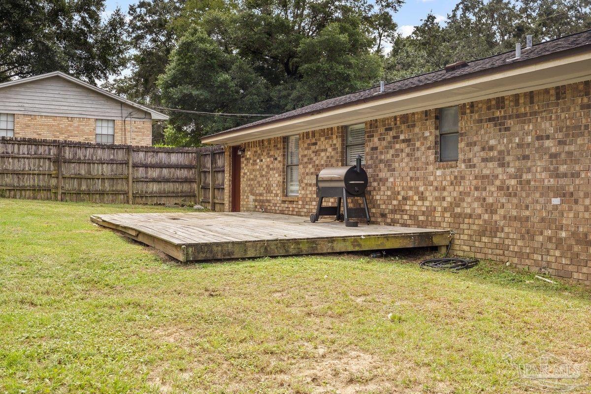 2194 Pompano Street Cantonment, FL 32533 - Photo 16 of 23 a view of a swimming pool with a patio