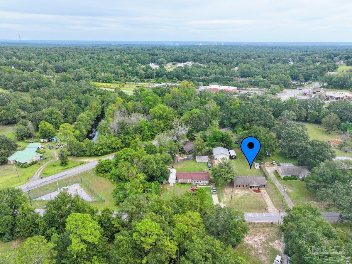2194 Pompano Street Cantonment, FL 32533 - Photo 22 of 23 an aerial view of a house with a yard