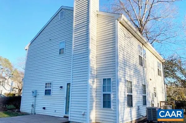a view of a house with a street