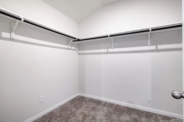 a view of a room with an empty space