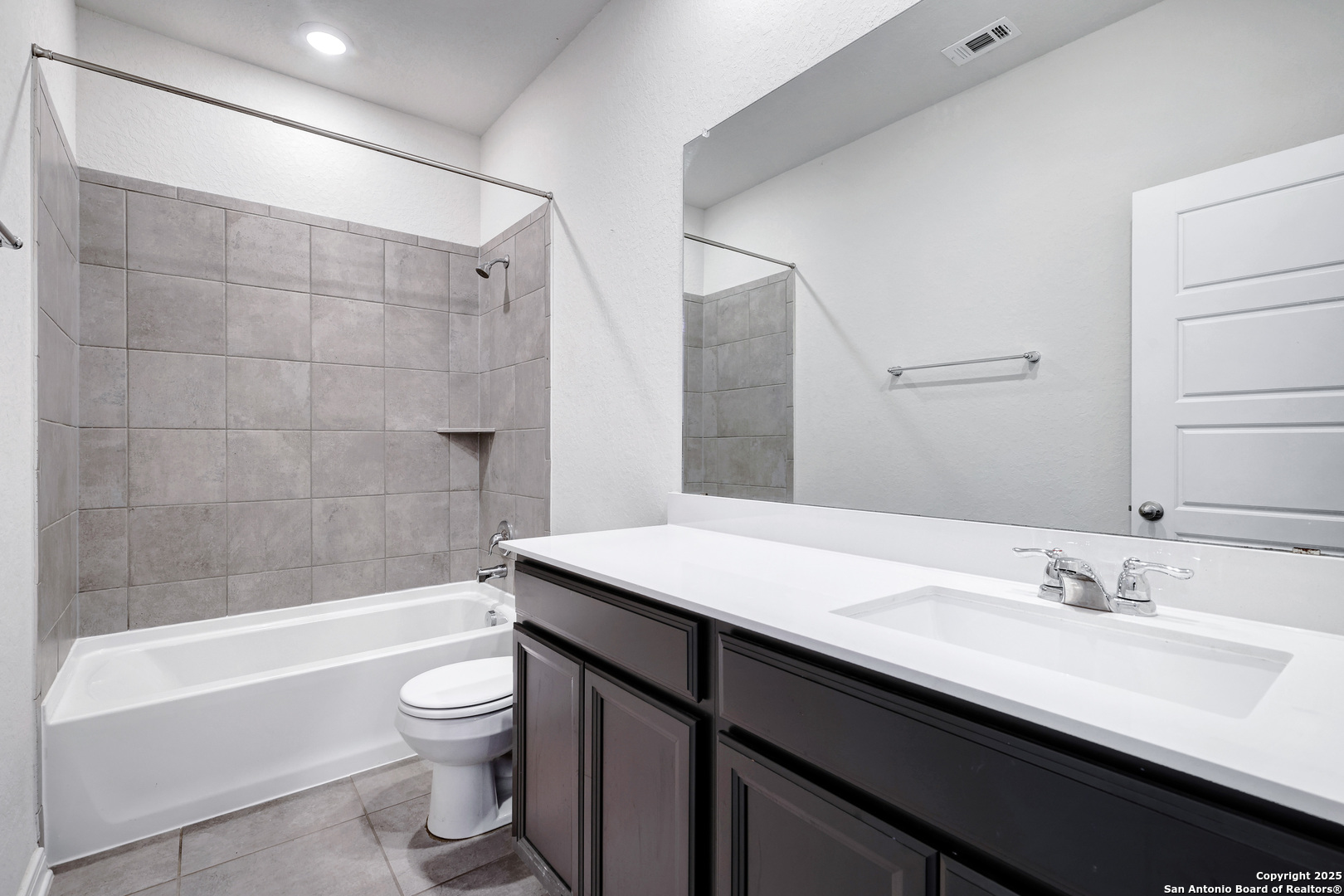 3168 Junction Bay Converse, TX 78109 - Photo 21 of 26 a bathroom with a sink a toilet and bathtub