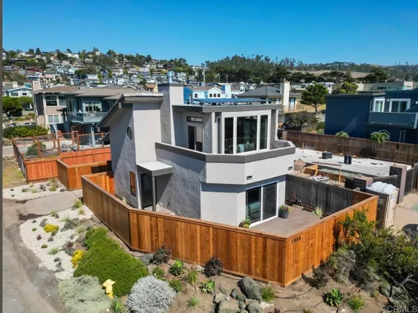 a view of a house with roof deck