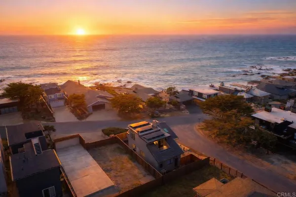 an aerial view of beach and ocean