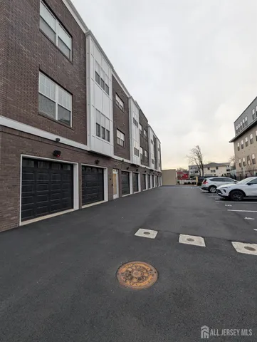 a view of street with parked cars