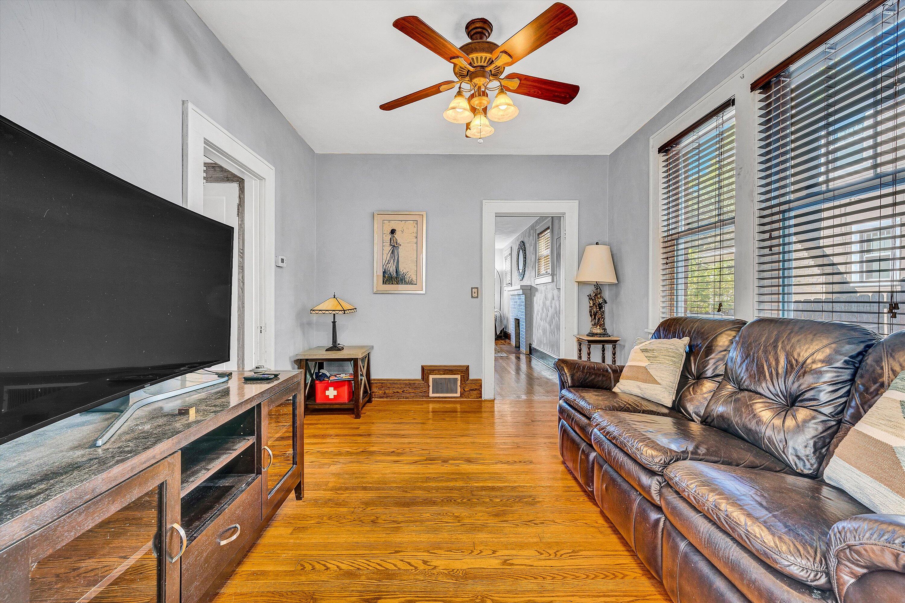 1013 Howbert Avenue Southwest Roanoke, VA 24015 - Photo 19 of 52 a living room with furniture and a flat screen tv