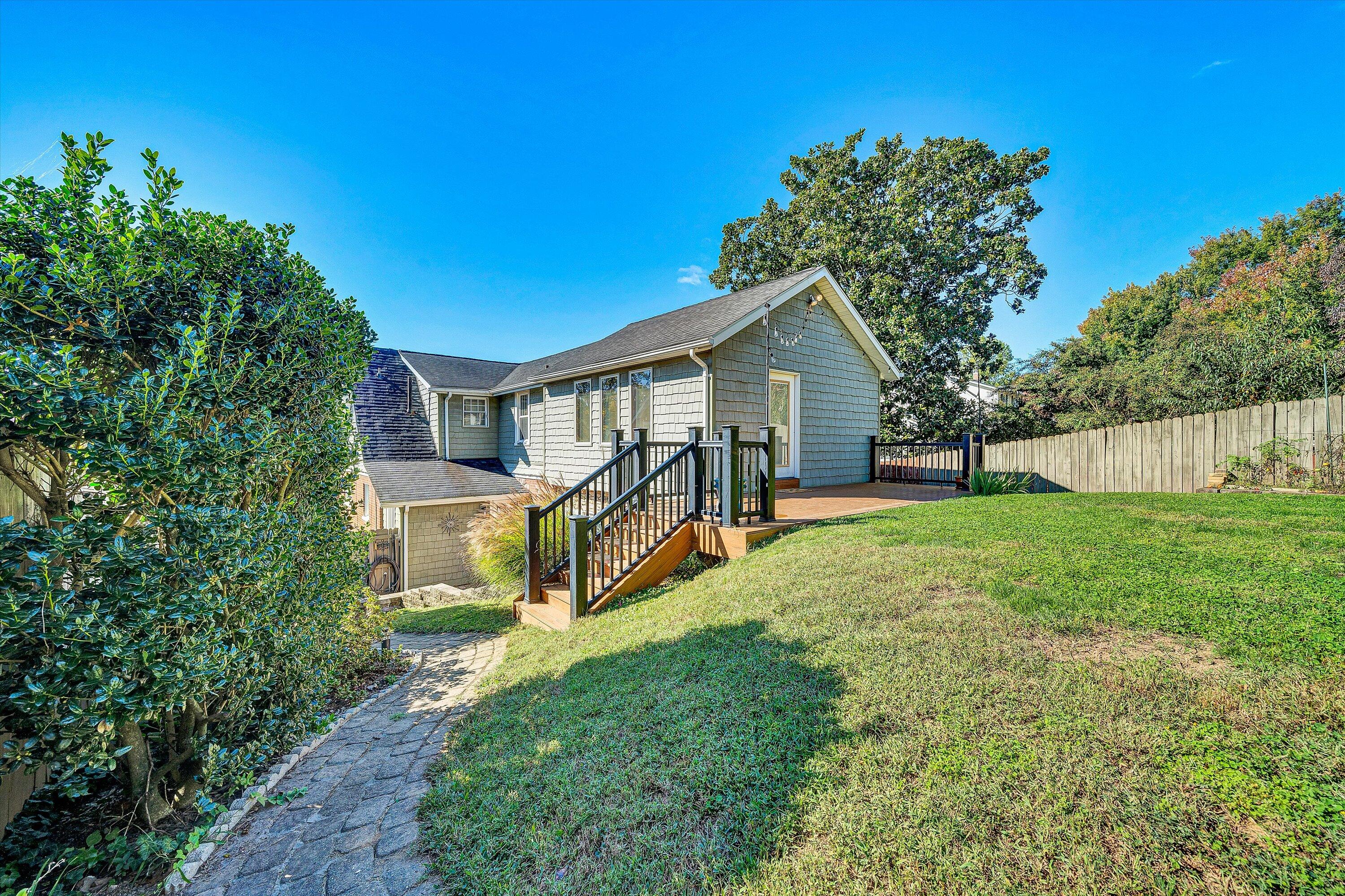 1013 Howbert Avenue Southwest Roanoke, VA 24015 - Photo 22 of 52 a house view with a garden space