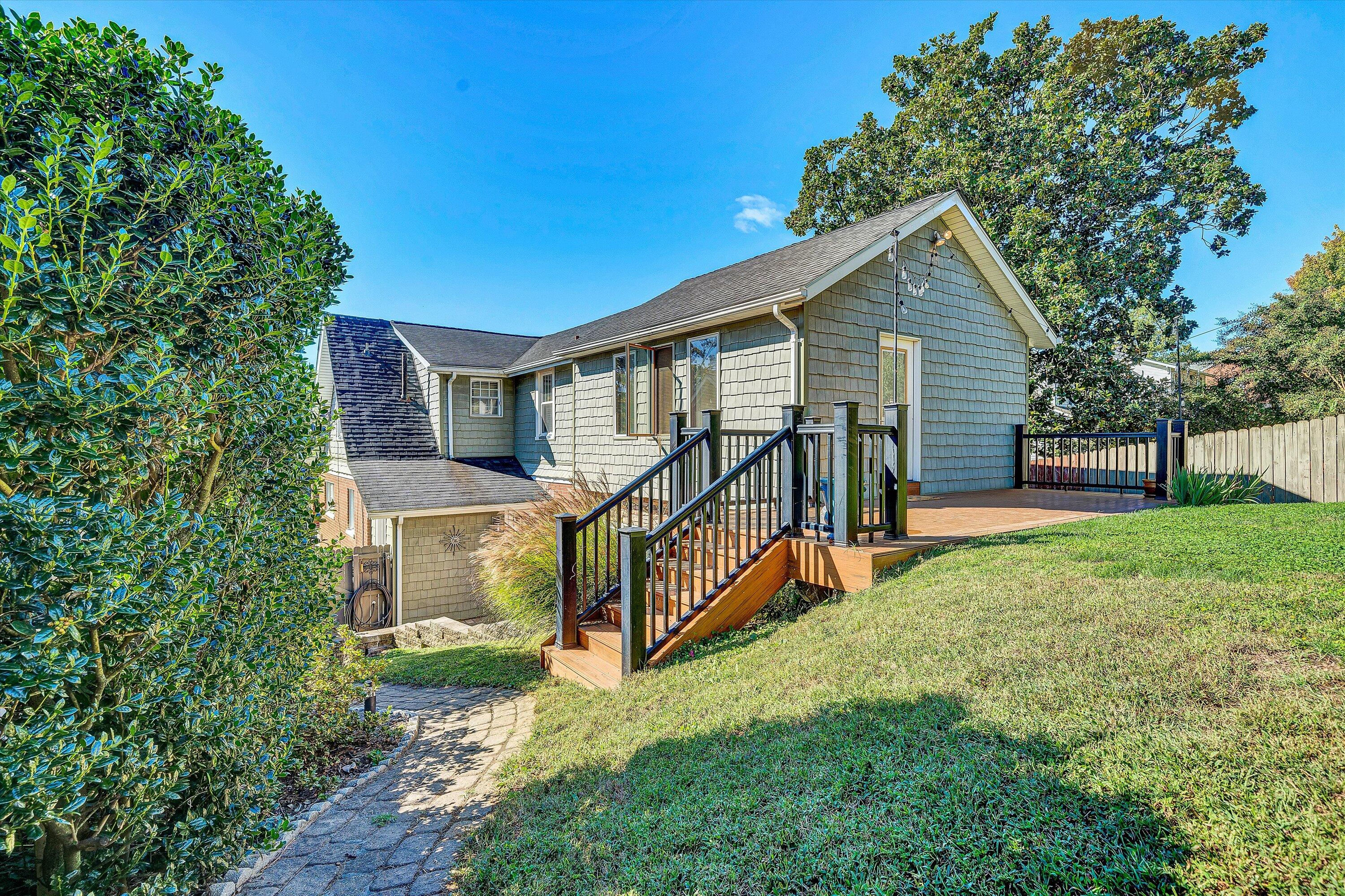 1013 Howbert Avenue Southwest Roanoke, VA 24015 - Photo 26 of 52 a view of a house with a yard deck and a small cabin