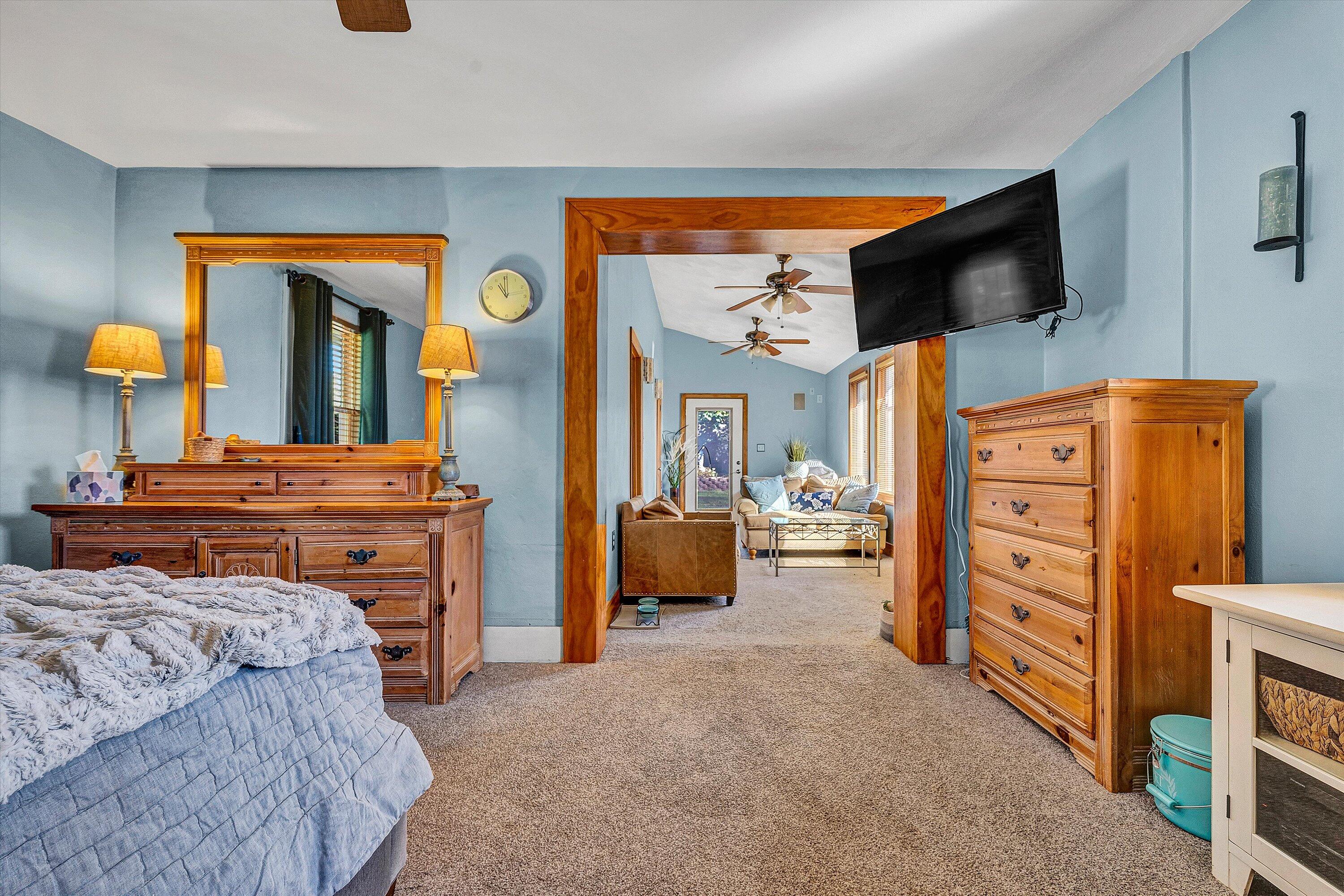 1013 Howbert Avenue Southwest Roanoke, VA 24015 - Photo 40 of 52 a bedroom with furniture and a flat tv screen